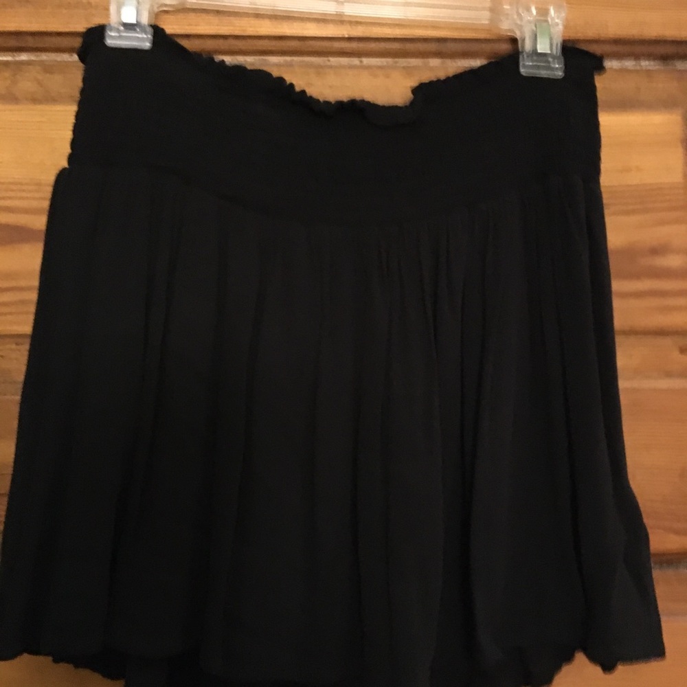 Black skirt with thick elastic waist band.